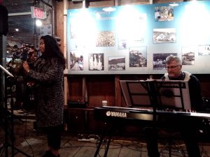 Feb 15, 2015 at the Cannery Farmer's Market. Maria wows everyone with her voice and Peter takes care of the keys!