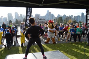 Karin from Steve Nash Sports leads the Warm-Up.